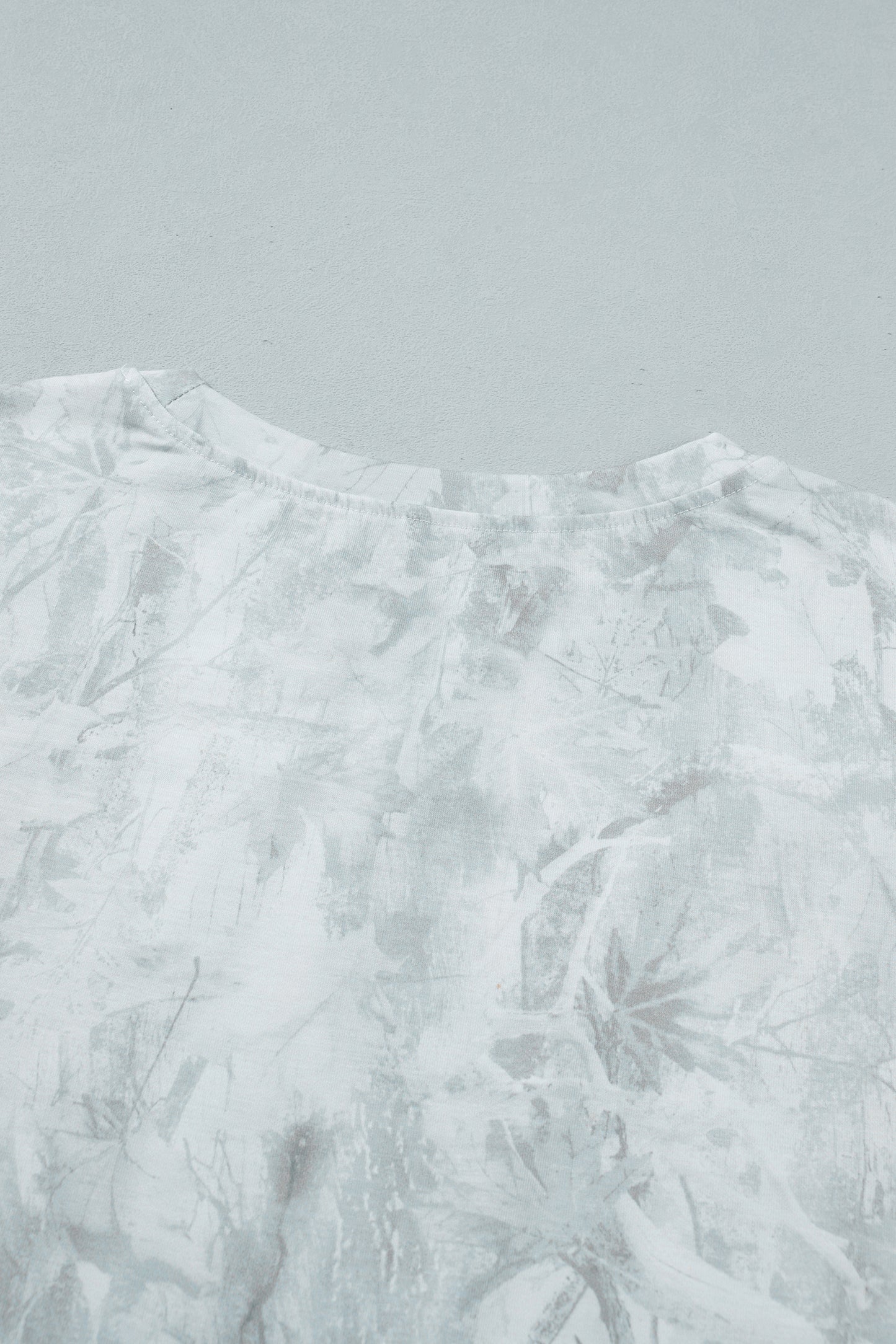 T-shirt oversize clair, encolure ronde et dos avec motif texturé, sans impression visible