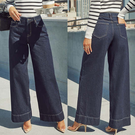 Jean taille haute bleu marine à jambe ample, poches devant, surpiqûres visibles