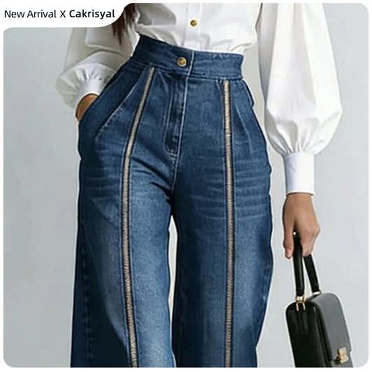 Jean taille haute bleu à zips dorés