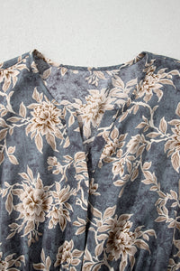 Robe bleu-gris imprimé floral, encolure arrondie, détail de plis