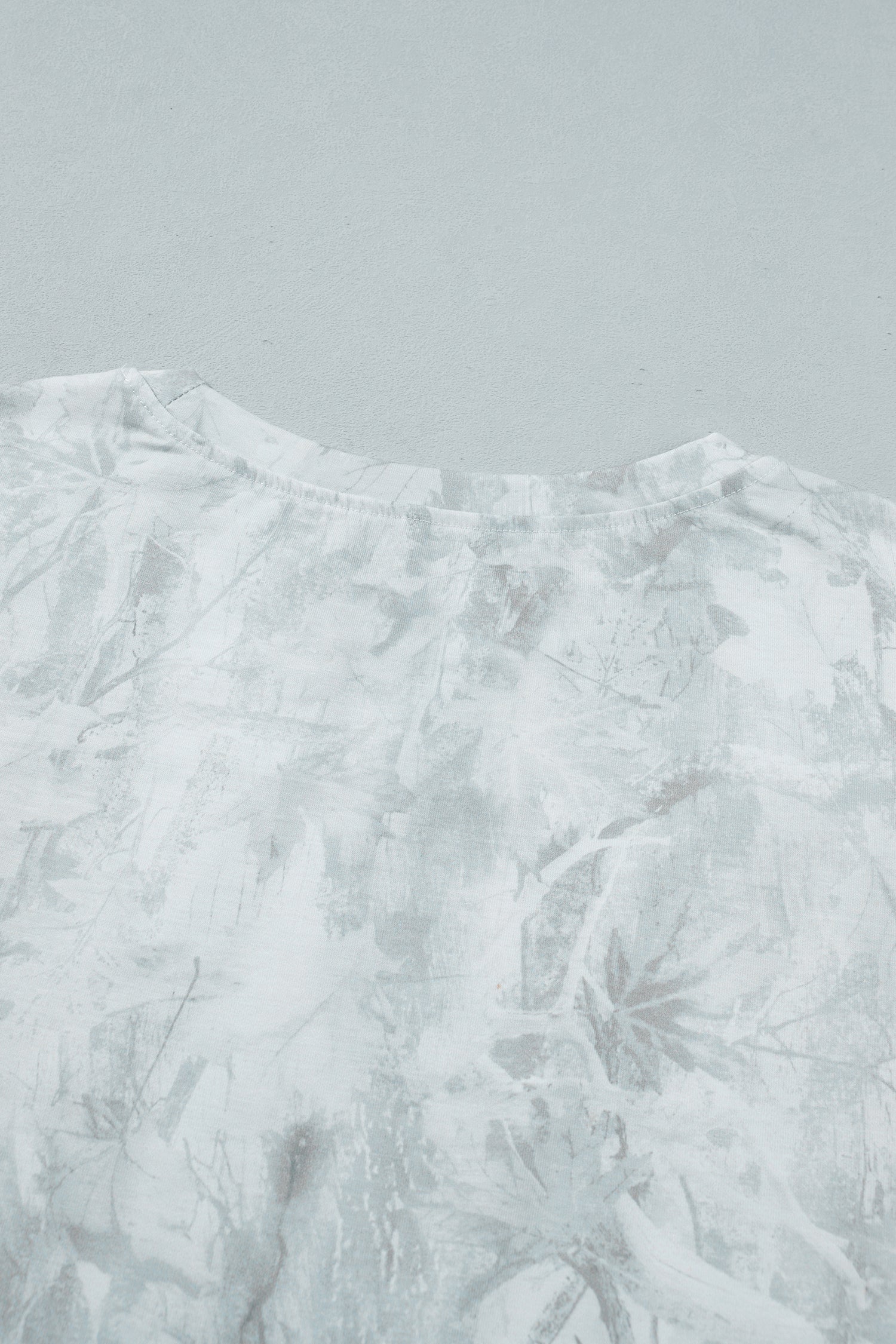T-shirt oversize clair, encolure ronde et dos avec motif texturé, sans impression visible