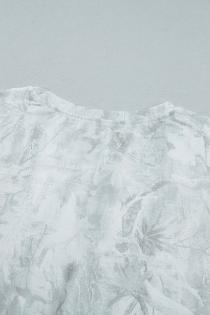 T-shirt oversize clair, encolure ronde et dos avec motif texturé, sans impression visible