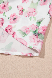 Pan de robe motif floral rose et vert sur fond clair, tissu léger
