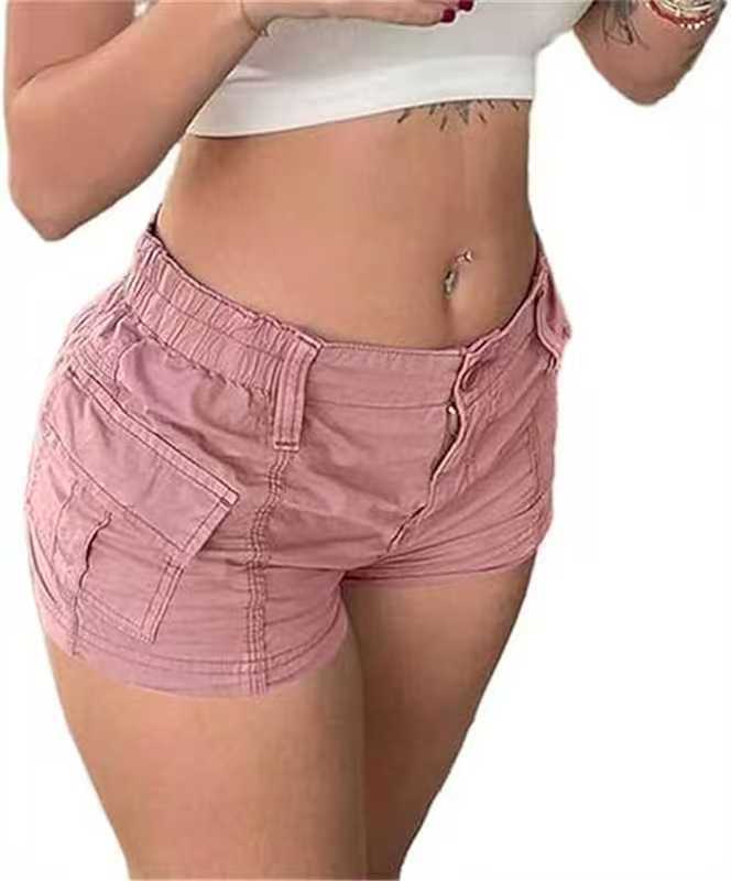 Short femme rose en tissu, taille froncée élastique, poches plaquées et zip.