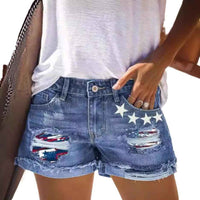 Short en jean bleu délavé avec appliques drapeaux et étoiles, taille à bouton