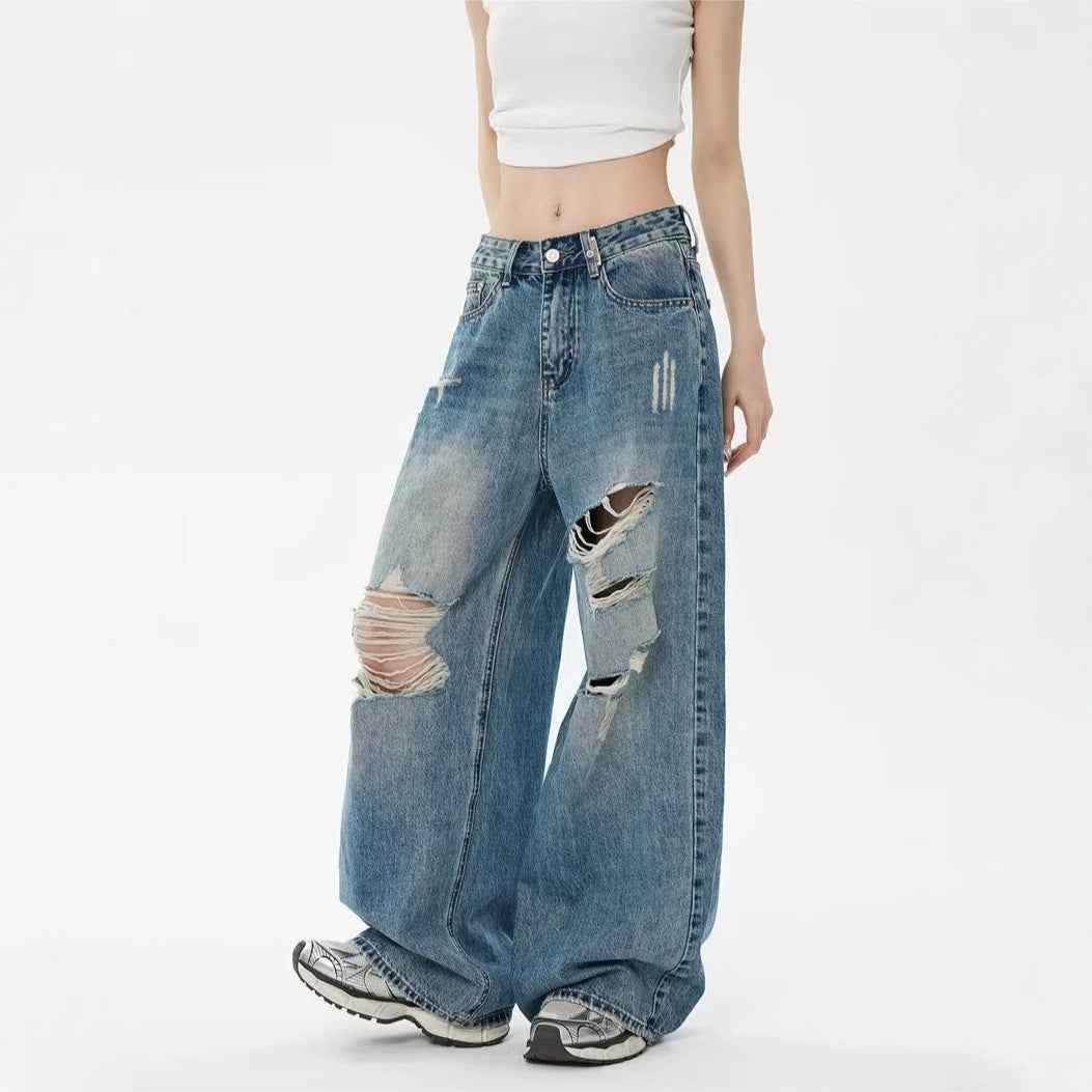 Pantalon en jean bleu loose, taille haute, déchirure au genou, effet usé devant