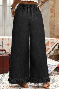 Pantalon jean noir ample, taille élastique, bas volanté, jambes larges