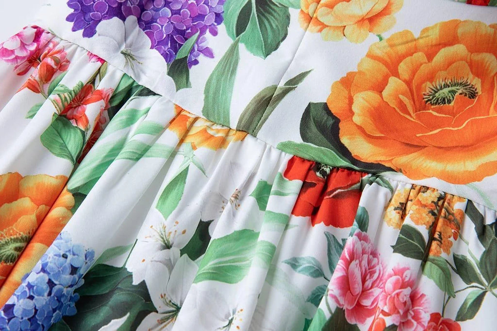 Robe d'Été fleurie 100% Élégance – Coupe Licou et Taille Affinée Féminine