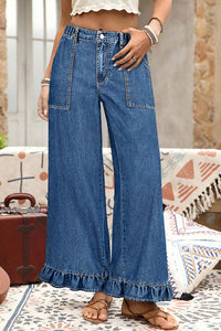 Pantalon jean bleu ample, taille élastique, poches avant et ourlet volanté