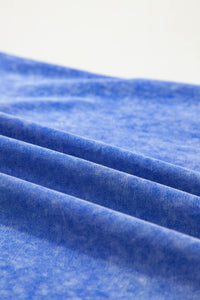Tissu coton bleu ciel, texture chinée du t-shirt