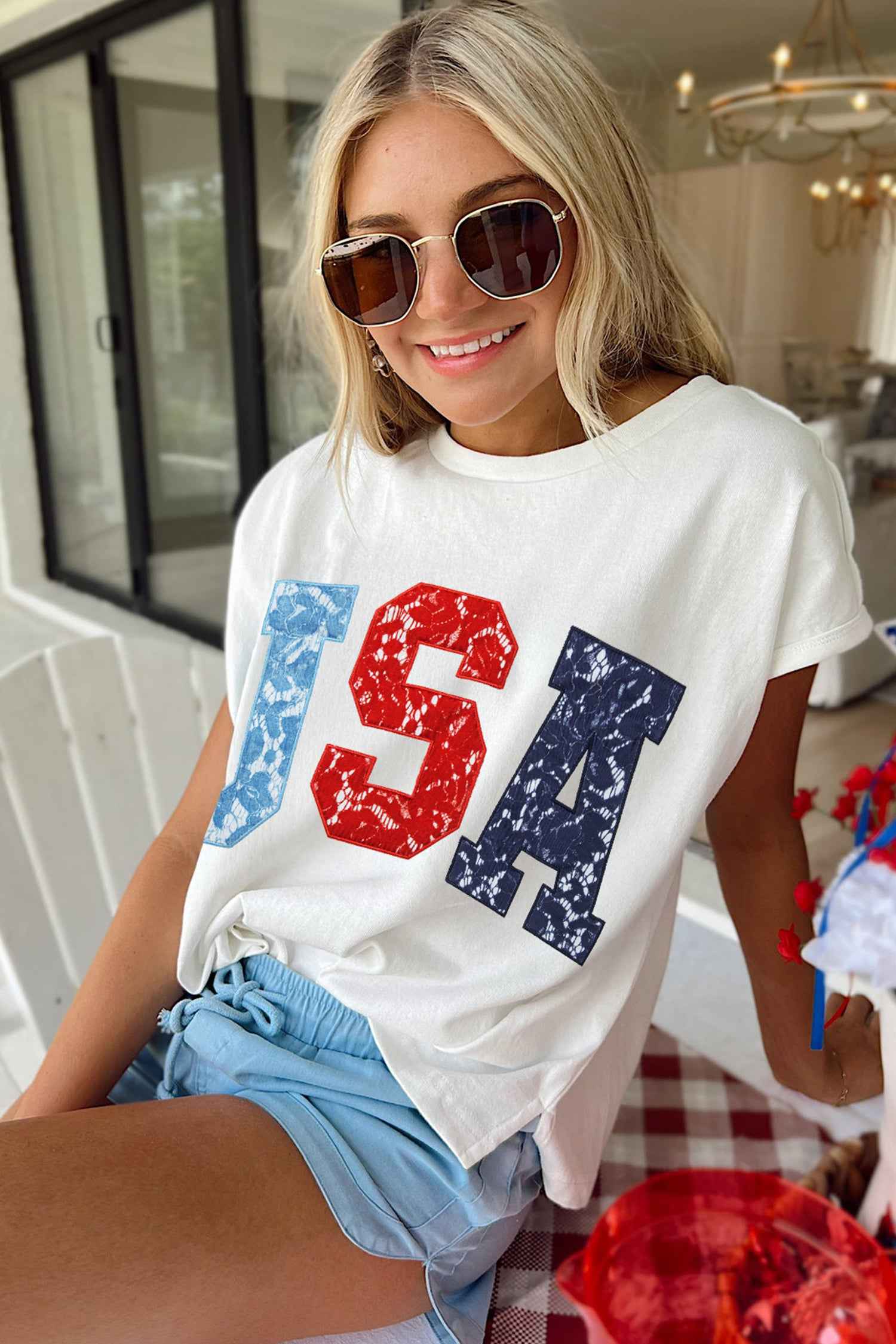 T-shirt dolman blanc pour femme, imprimé USA rouge et bleu, coupe ample.