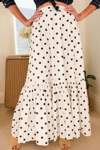 Jupe longue à pois noirs sur fond blanc, taille élastique et volants en étages