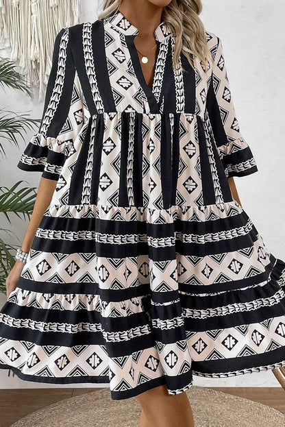 Robe noire imprimé géométrique col V manches à volants femme