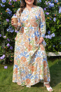 Robe longue bohème à imprimé floral multicolore, encolure ronde, manches 3/4.