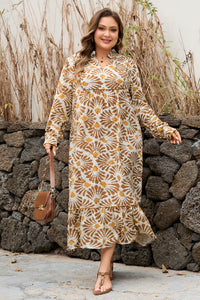 Robe longue à manches longues, imprimé végétal abstrait ocre, encolure boutonnée, coupe droite.