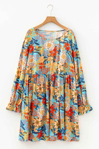 Robe mini bleue florale, dos boutonné et manches longues bouffantes à volants