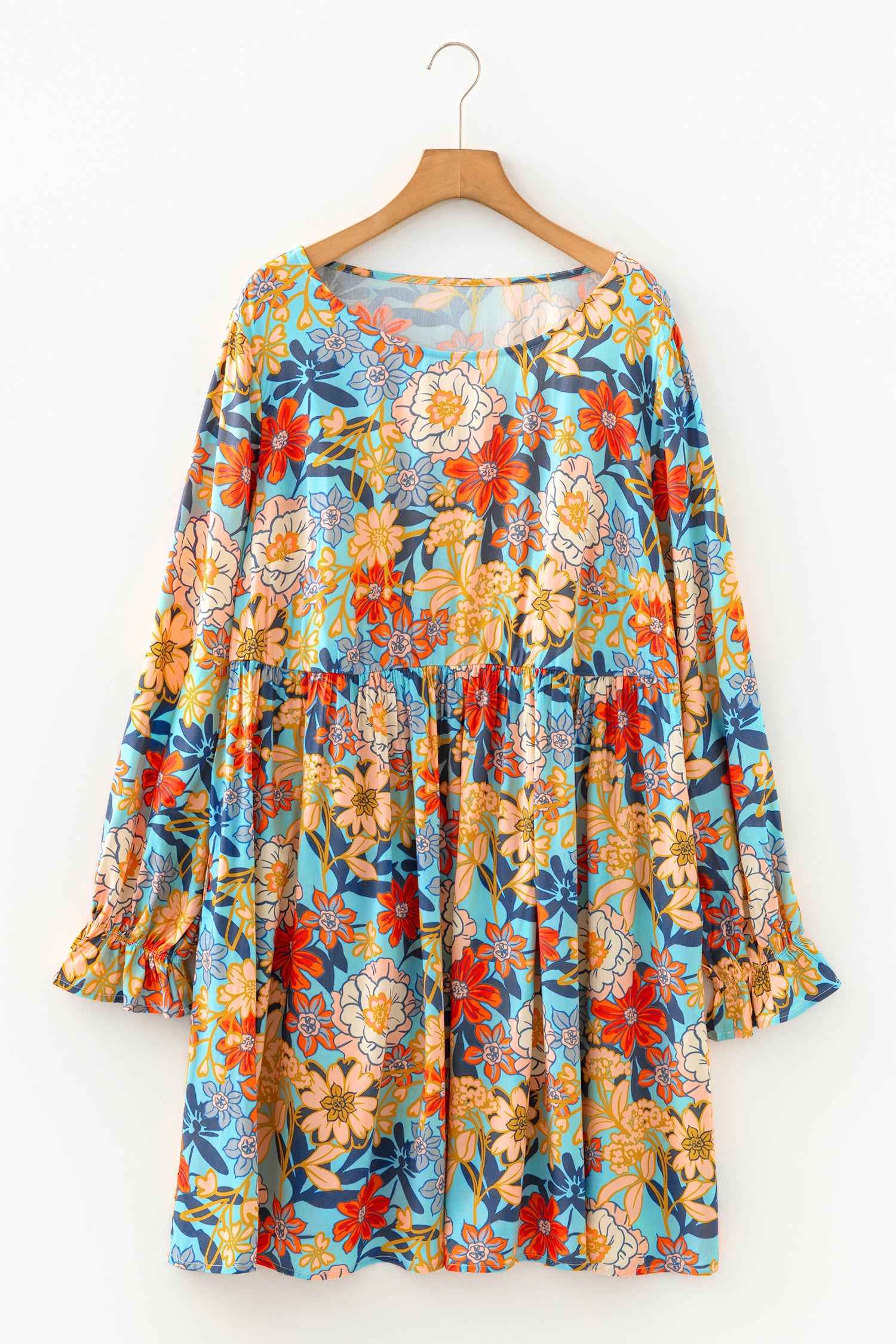 Robe mini bleue florale, dos boutonné et manches longues bouffantes à volants
