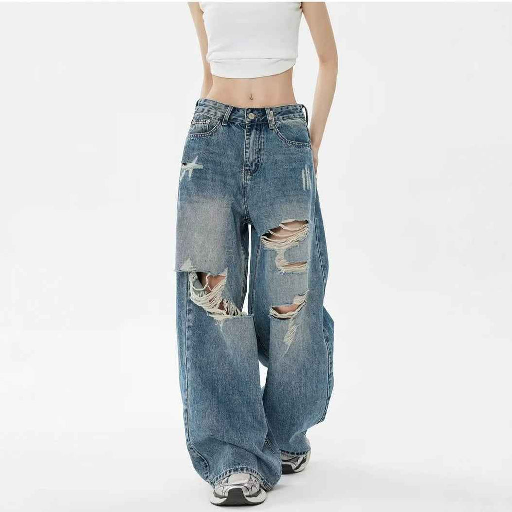 Pantalon en jean bleu taille haute ample, déchirures aux genoux, poches arrière