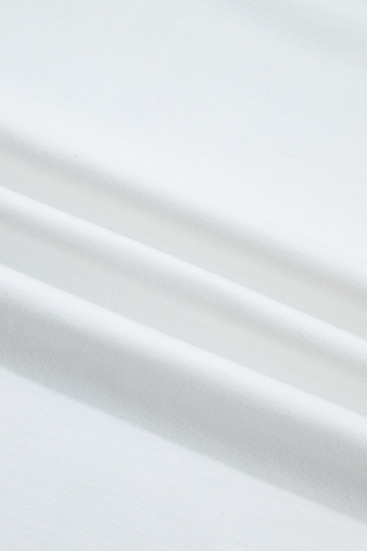 Tissu du t-shirt blanc, coton lisse
