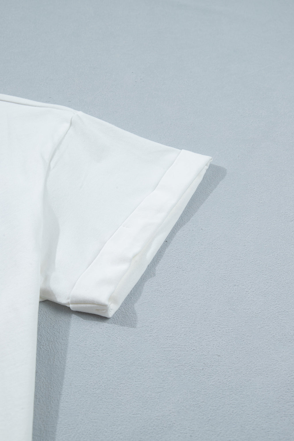 Manche courte du haut femme blanc en coton, bordure nette