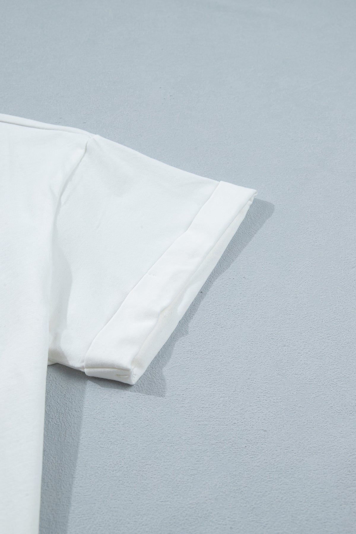 Manche courte du haut femme blanc en coton, bordure nette