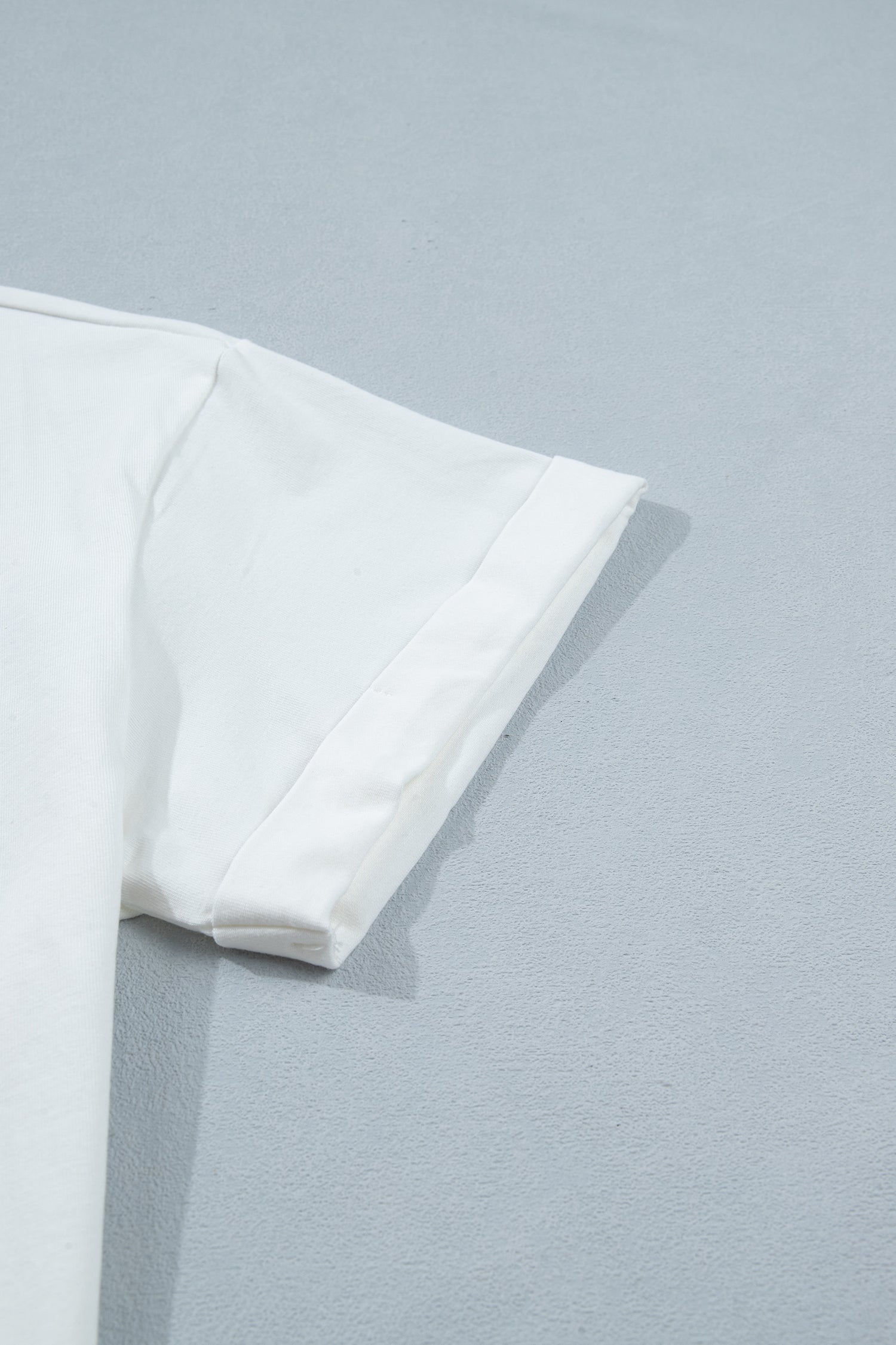 Manche courte du haut femme blanc en coton, bordure nette