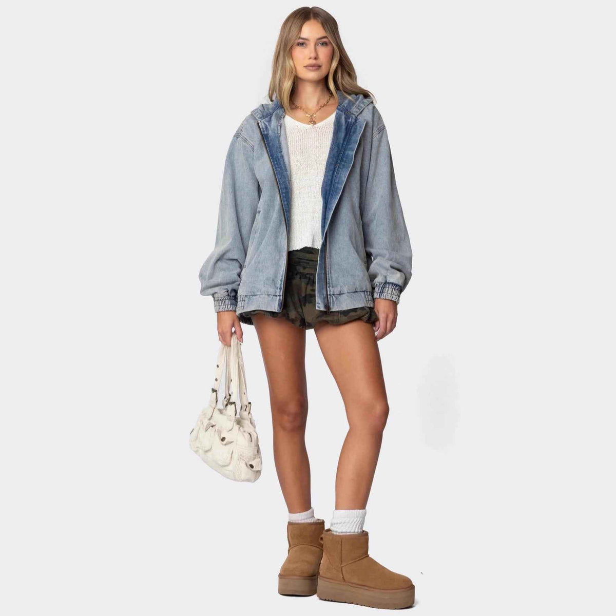 Veste en jean bleu clair à capuche, surpiqûres et coupe ample