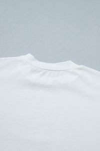 Haut femme blanc en coton, col rond avec encolure soignée