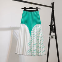 Jupe plissée à taille élastique, imprimé vert, partie blanche à pois verts