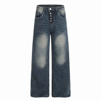 Jean femme bleu taille mi-haute, patte boutonnée et poches avant à coutures.