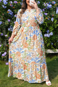 Robe longue bohème imprimée florale multicolore, fronces à la taille, manches 3/4.