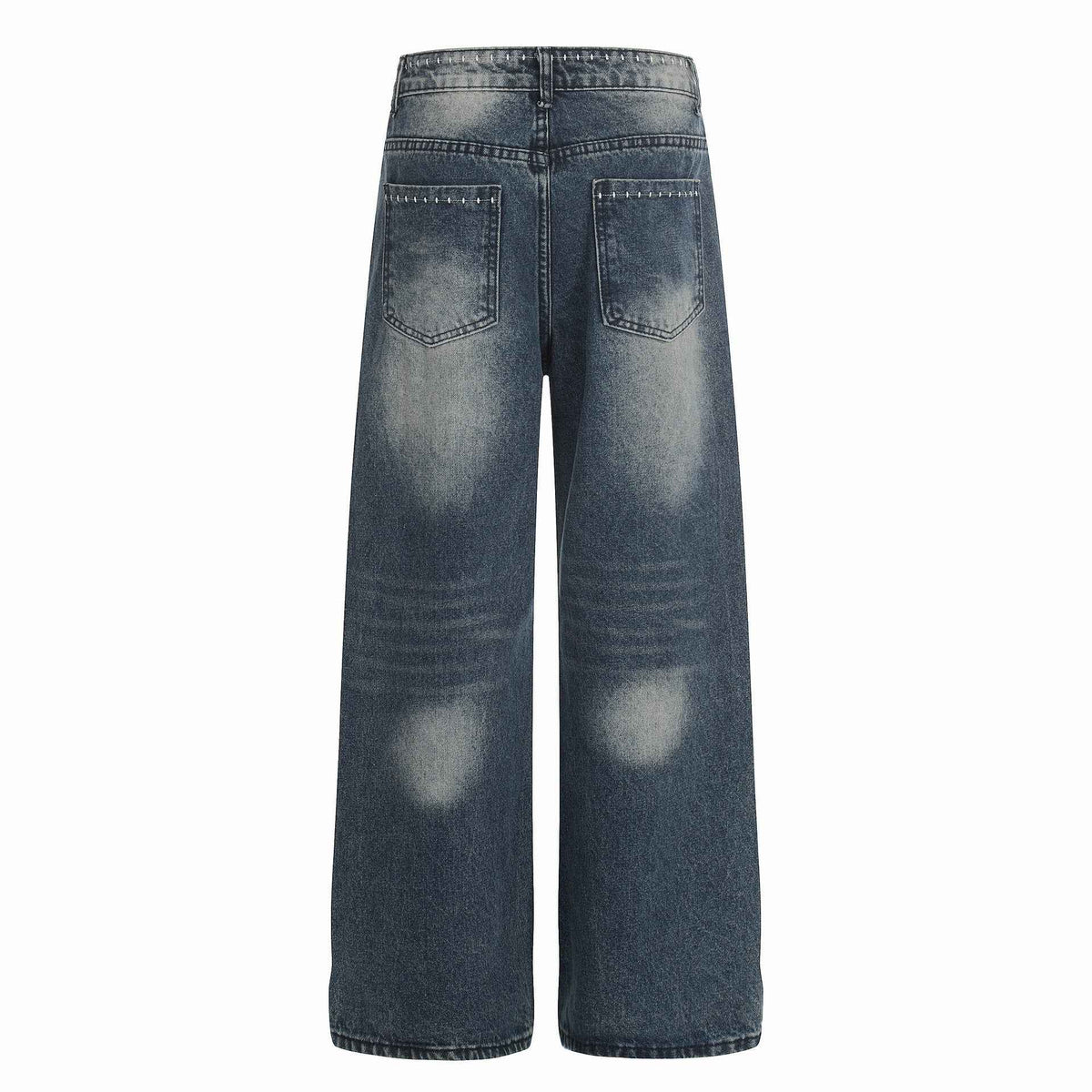 Jean femme bleu taille mi-haute, poches arrière et coutures contrastées.