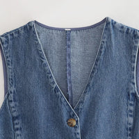 Gilet en denim bleu sans manches, encolure en V et surpiqûres