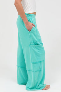 Pantalon cargo femme turquoise, poche cargo sur la jambe et coupe ample