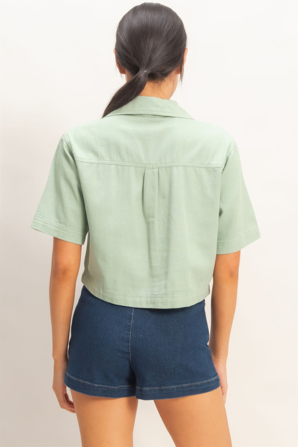 Haut femme coton vert clair manches courtes, dos structuré sans poche visible