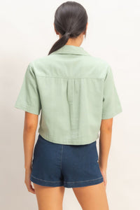 Haut femme coton vert clair manches courtes, dos structuré sans poche visible