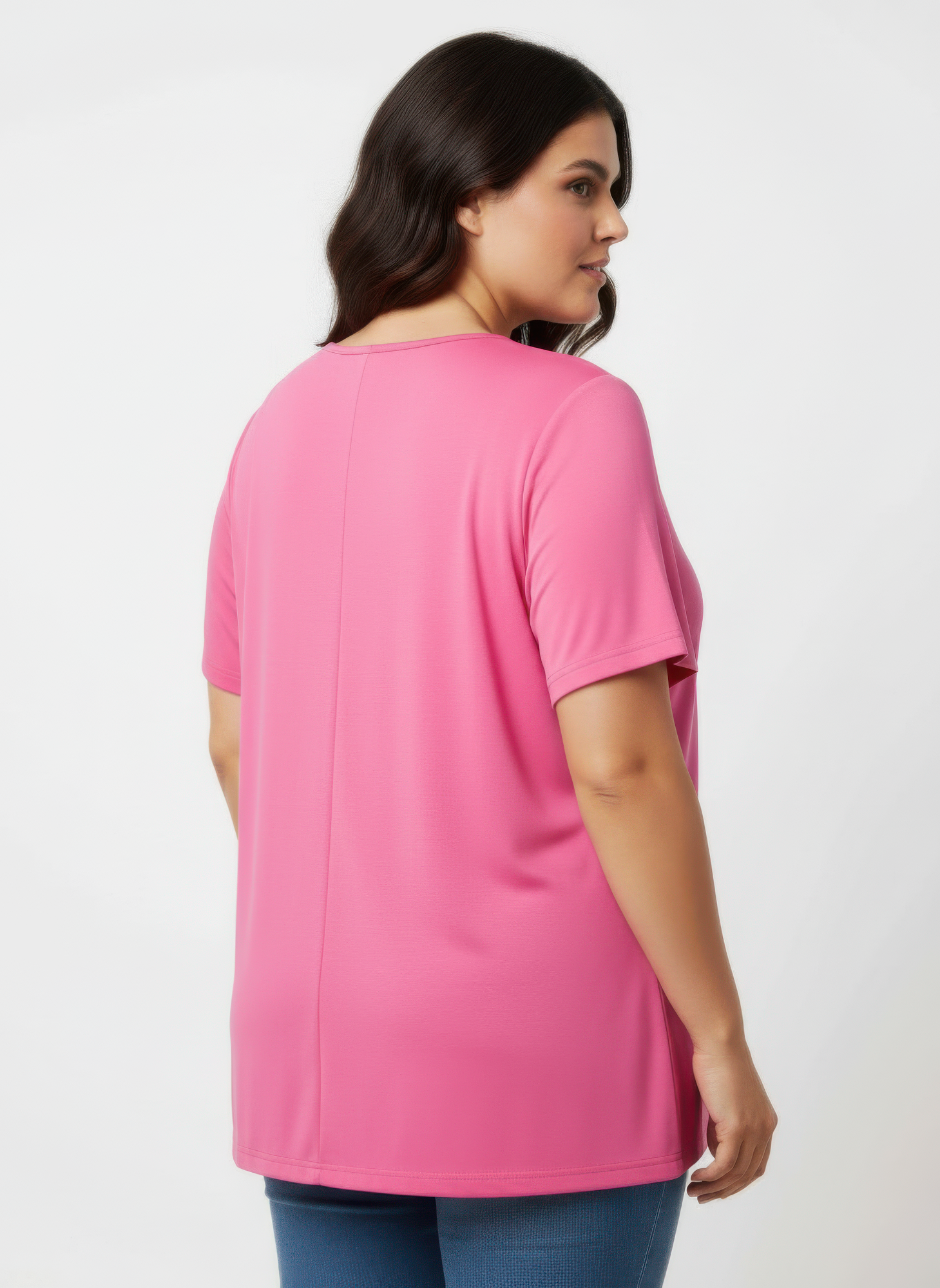 Haut en maille rose, dos uni, manches courtes.