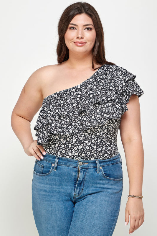 Body grande taille noir à motif floral, une épaule, volants superposés.