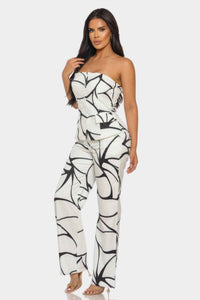 Ensemble top bandeau sans bretelles et pantalon large, imprimé noir et blanc.
