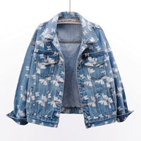 Veste en jean bleue pour femme, motif floral blanc sur le devant, poches et poignets boutonnés