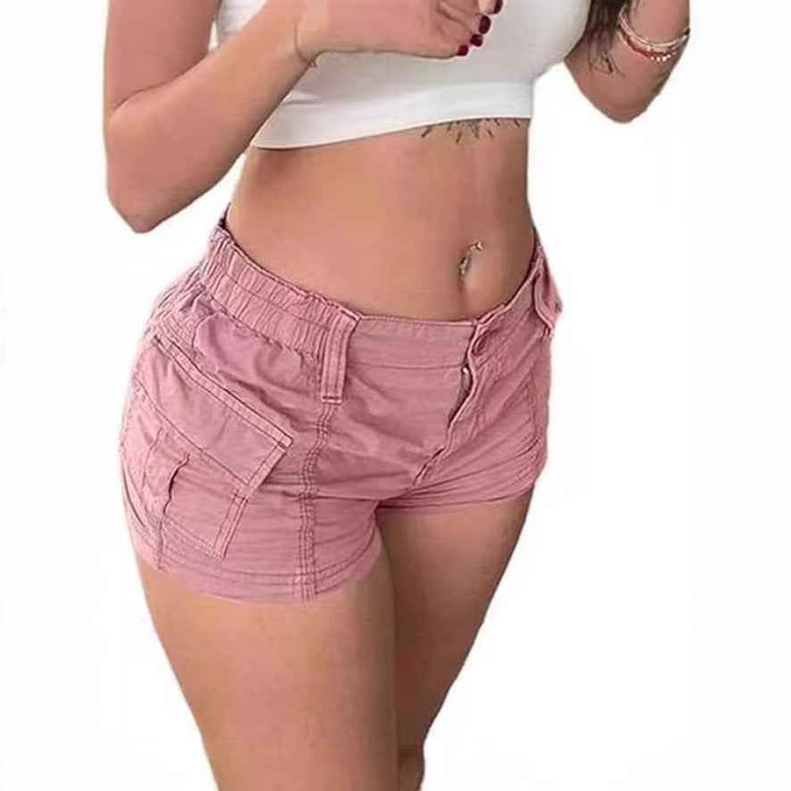 Short femme rose en tissu, taille élastique, poches plaquées et fermeture zippée.
