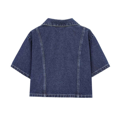 Veste en jean bleu foncé, dos droit avec couture centrale et empiècements