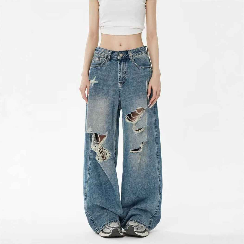 Pantalon en jean bleu taille haute ample, déchirures aux genoux, braguette boutonnée