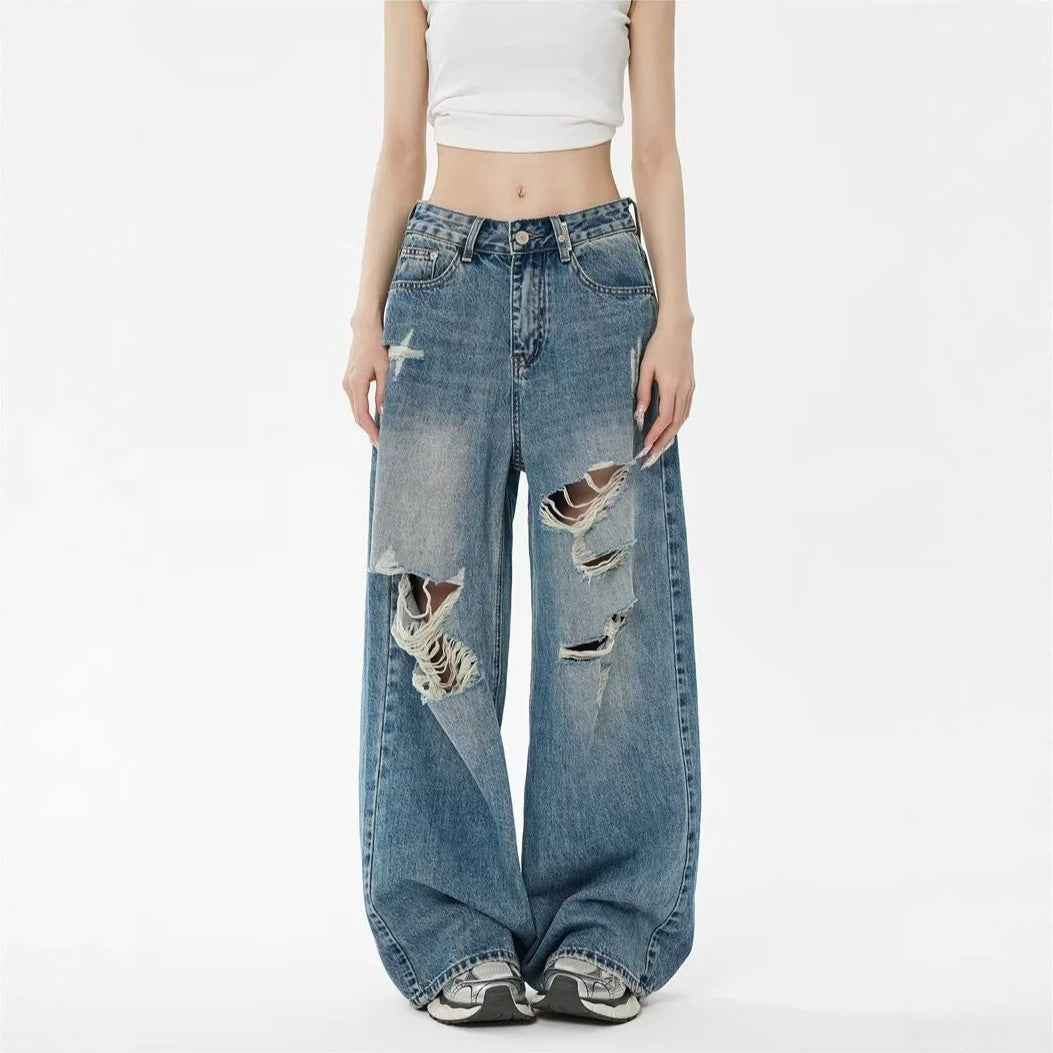 Pantalon en jean bleu taille haute ample, déchirures aux genoux, braguette boutonnée