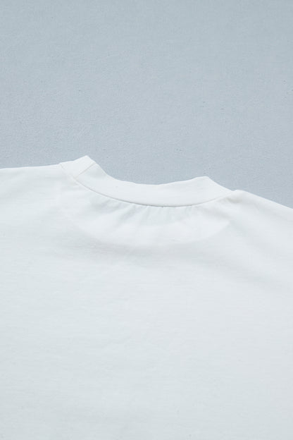 Haut femme blanc en coton, col rond avec encolure soignée
