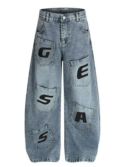 Jean femme taille haute bleu clair, jambes amples loose, poches avec lettres imprimées