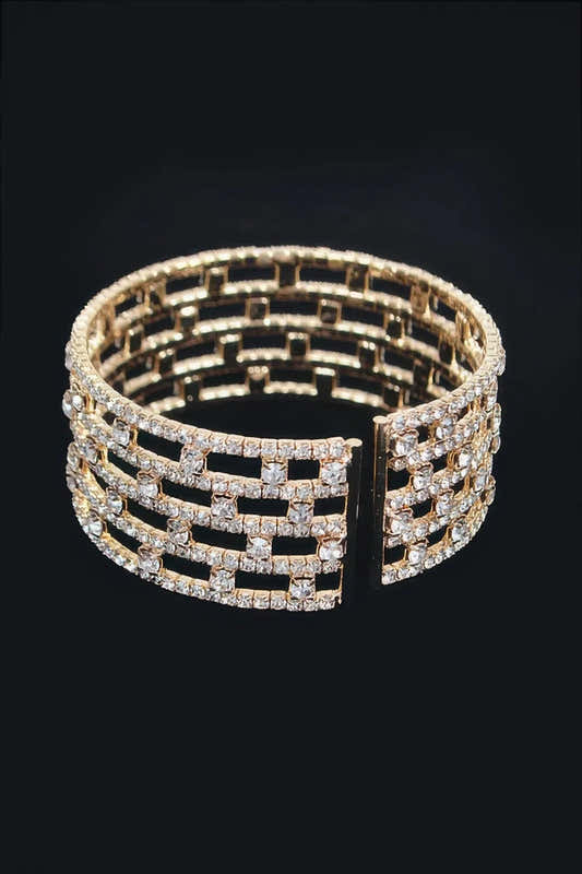 Jonc à strass motif grille, monture dorée, vue de dessus ouverte.