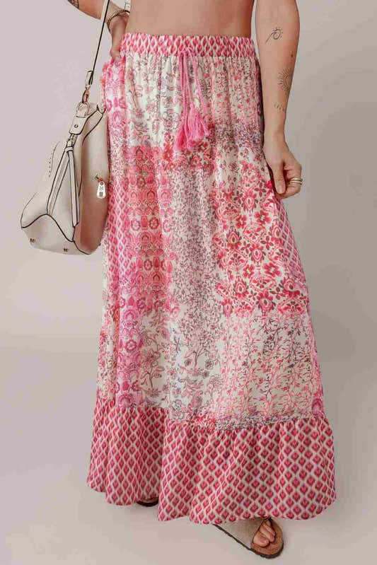 Jupe longue bohème rouge à motifs floraux, taille élastique et volants en bas