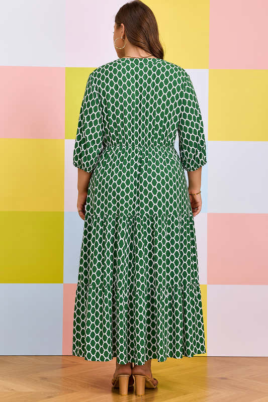 Robe maxi verte à motif géométrique, dos intégral, coupe ample, manches 3/4.