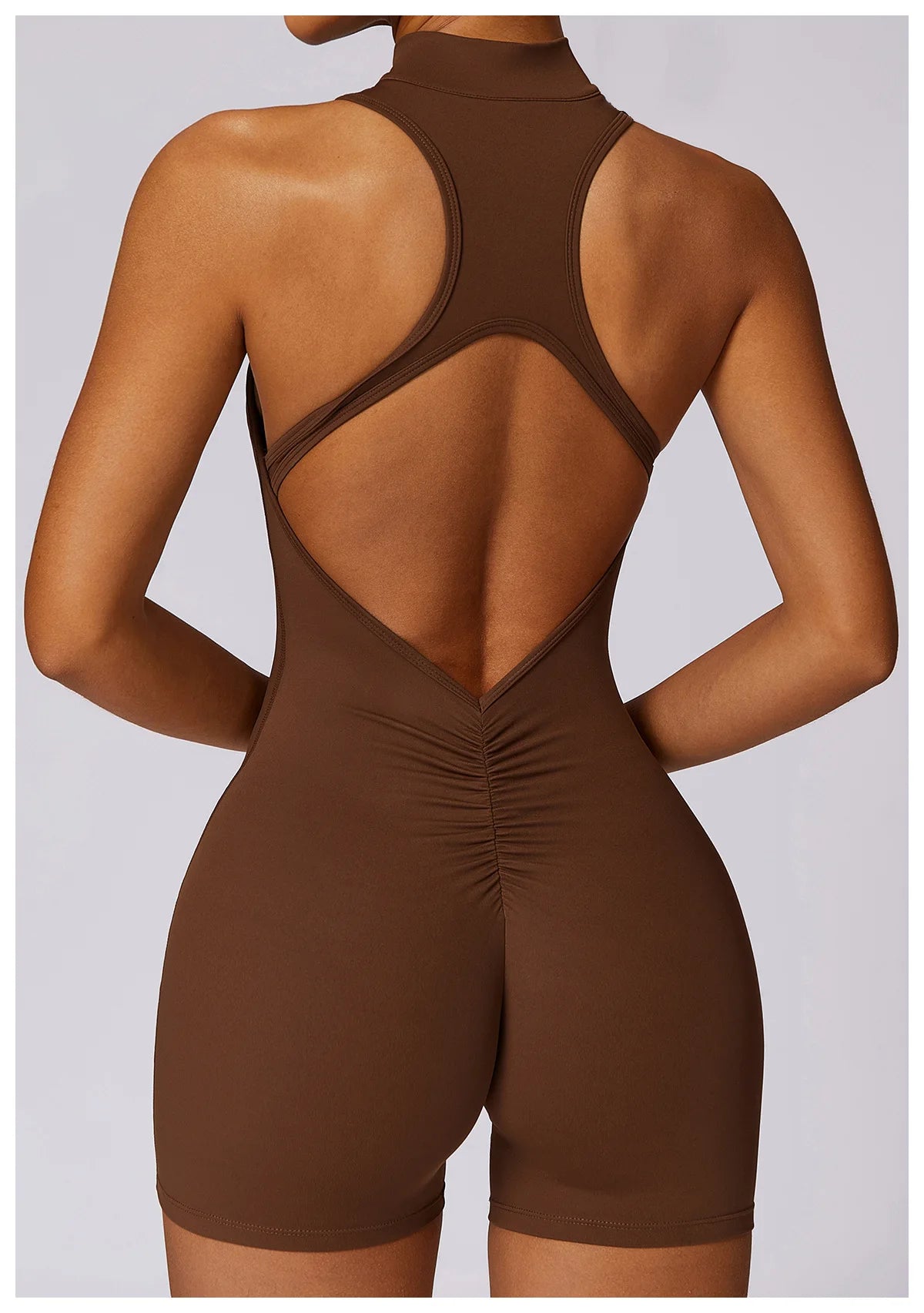 Couleur unie dos nu dos taille Scrunch Yoga combinaison ensemble court femmes fermeture éclair vêtements de sport Fitness une pièce sport costume entraînement
